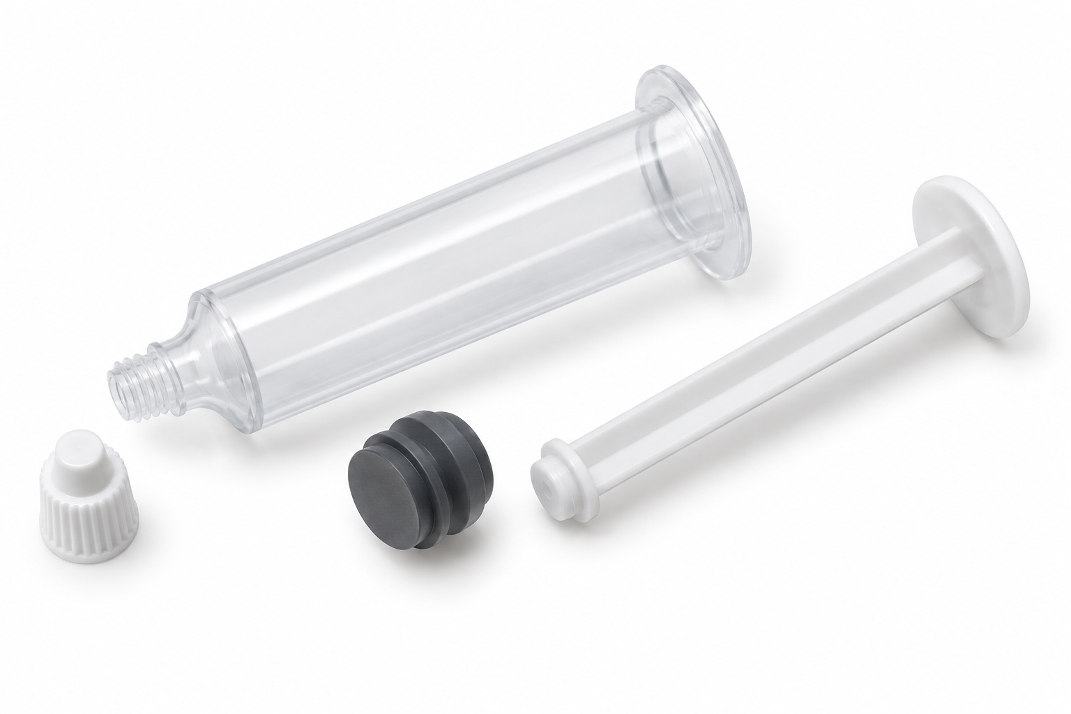 Components of a cockroach gel bait syringe: barrel, piston, plunger rod, and tip cap