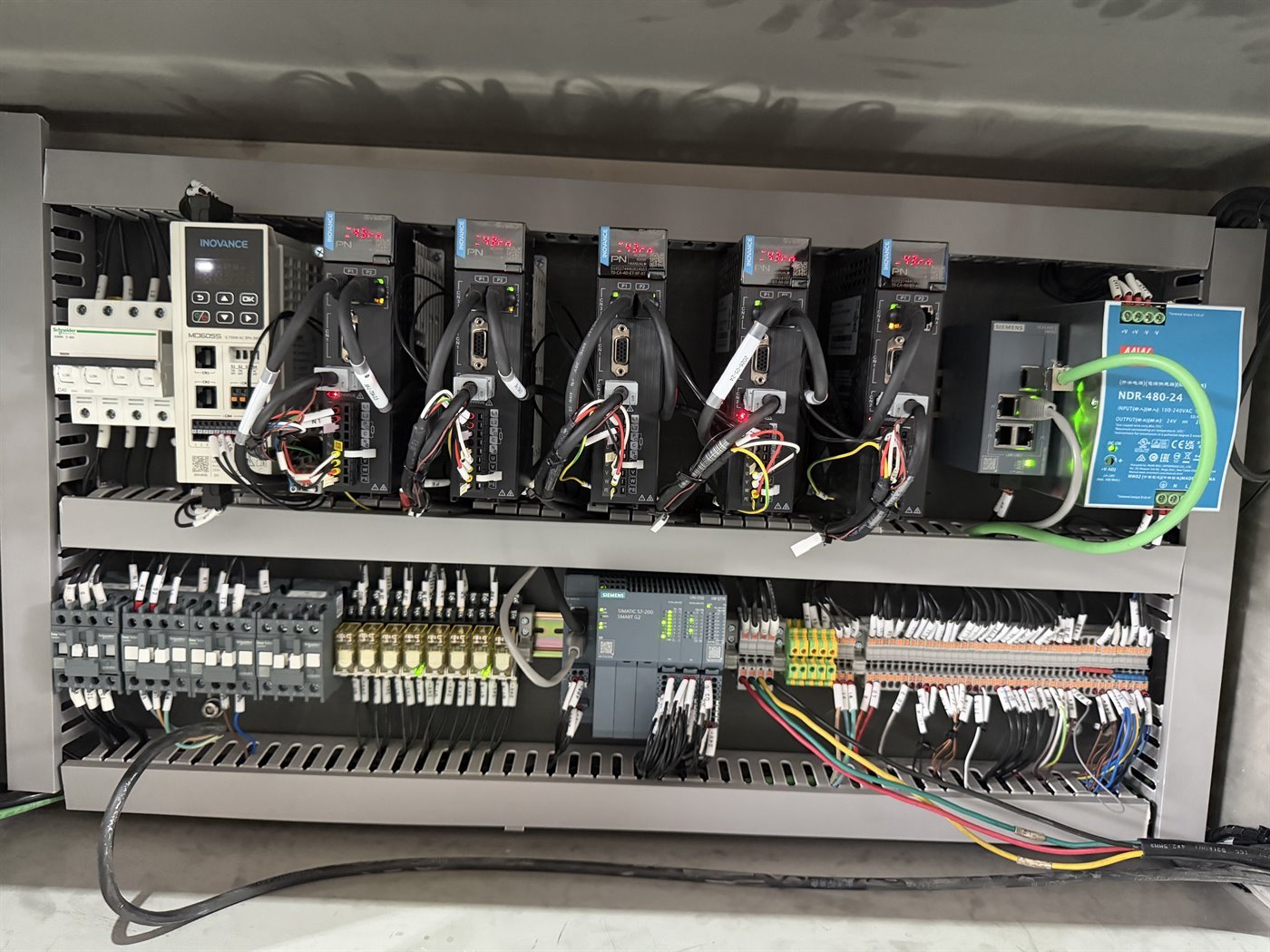 Industrial electrical control cabinet with Siemens PLC and servo drives